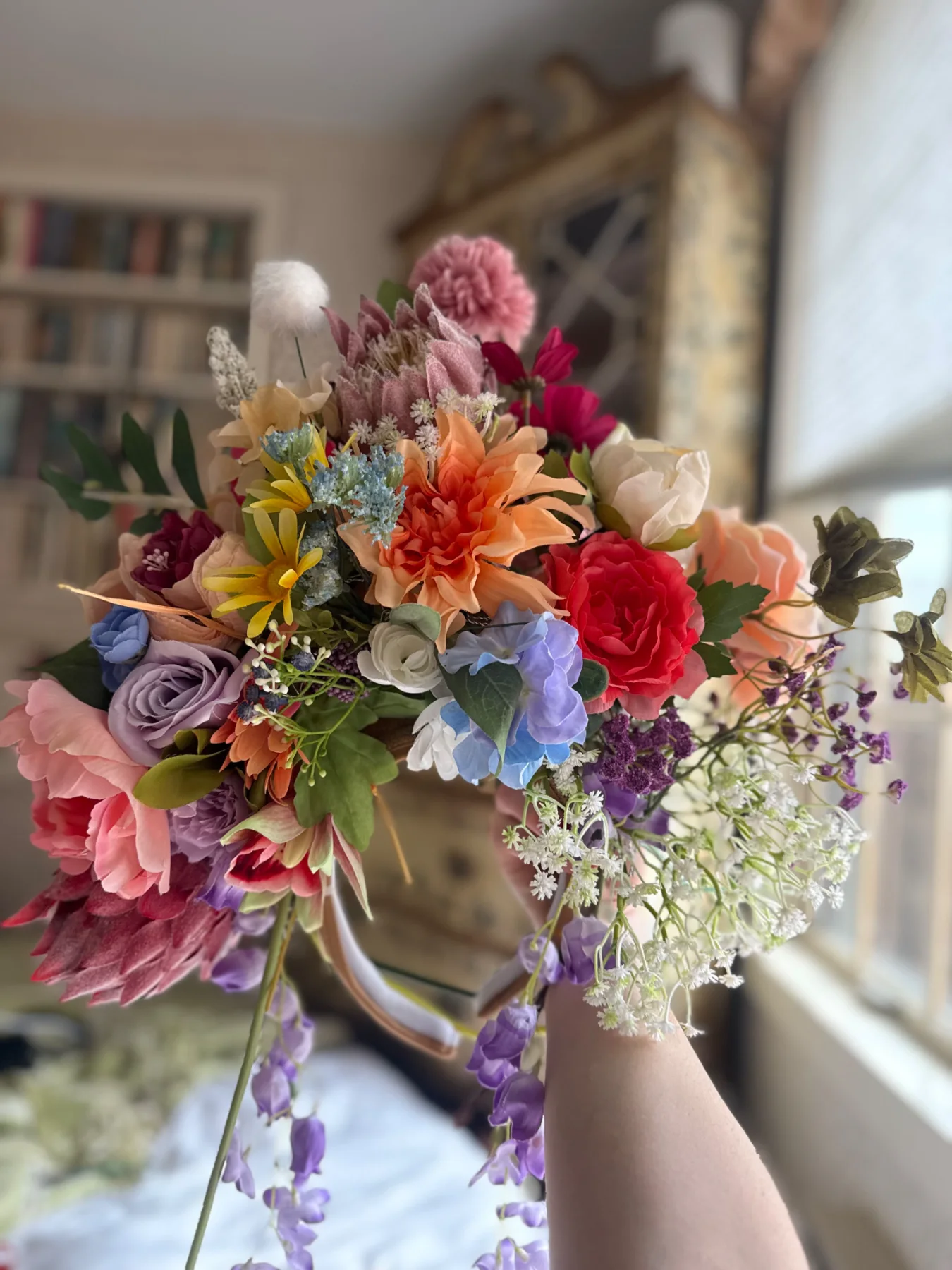 A wildflower bouquet held up to the light